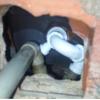 Reparación de fuga de agua desagüe plato de ducha