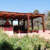 Barbacoa  y horno de leña con cerramiento en pino del país tratado  
