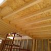 Contrición de casa de madera