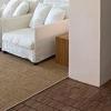 Fundas sofás a medida , pavimento y alfombra sisal a medida , pintura piso y mobiliario realizado por la decoradora 