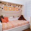 Habitaciones infantiles con decoración personalizada y zona para colgar sus fotos