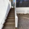 C/Viladomat - tarima terraza y forrado de escalera