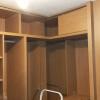 Esquina alta de vestidor con puertas correderas