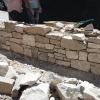 Construcció mur amb pedra