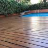 Restauración lijado y barniz sobre tarima de madera piscina