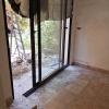 Colocación de suelo y puerta corredera de jardin