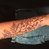 Tatuaje flores brazo