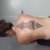 Tatuaje flores espalda