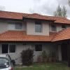 Limpieza de tejado y renovación de fachada con pintura impermeable