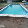 piscina 7x4  gresite azul niebla  coronación porcelánico C3 ubicada en otero Toledo   