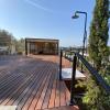 Terraza más casita de jardin