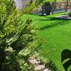 Instalación de césped artificial 40 mm en jardín particular