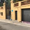 Saneado y pintado puertas de entrada y de parking