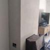 Microcemento en frontal chimenea