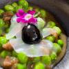Guisantes con butifarra y velo de calamar