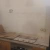 Colocación de plaqueta simulando muro de piedra en cocina