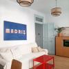 Renovación de salón, ladrillo visto, pintura y decoración