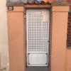 FABRICACION Y COLOCACION DE PUERTA DE ENTRADA A COMUNIDAD DE VECINOS