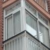 Exterior cerramiento en RPT, fijos inferiores correderas en medio y fijos superiores y embellecedores en los laterales