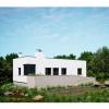 Vivienda unifamiliar entre encinas