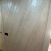 Pared decorativa con estuco texturizado en el pasillo de un piso reformado - LUCMAR URBA
