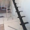 Escalera ala de avión : Rematando estructura de hierro con un toque de pintura