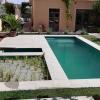 Piscina natural con un apartado para platas acuátIcasico 1